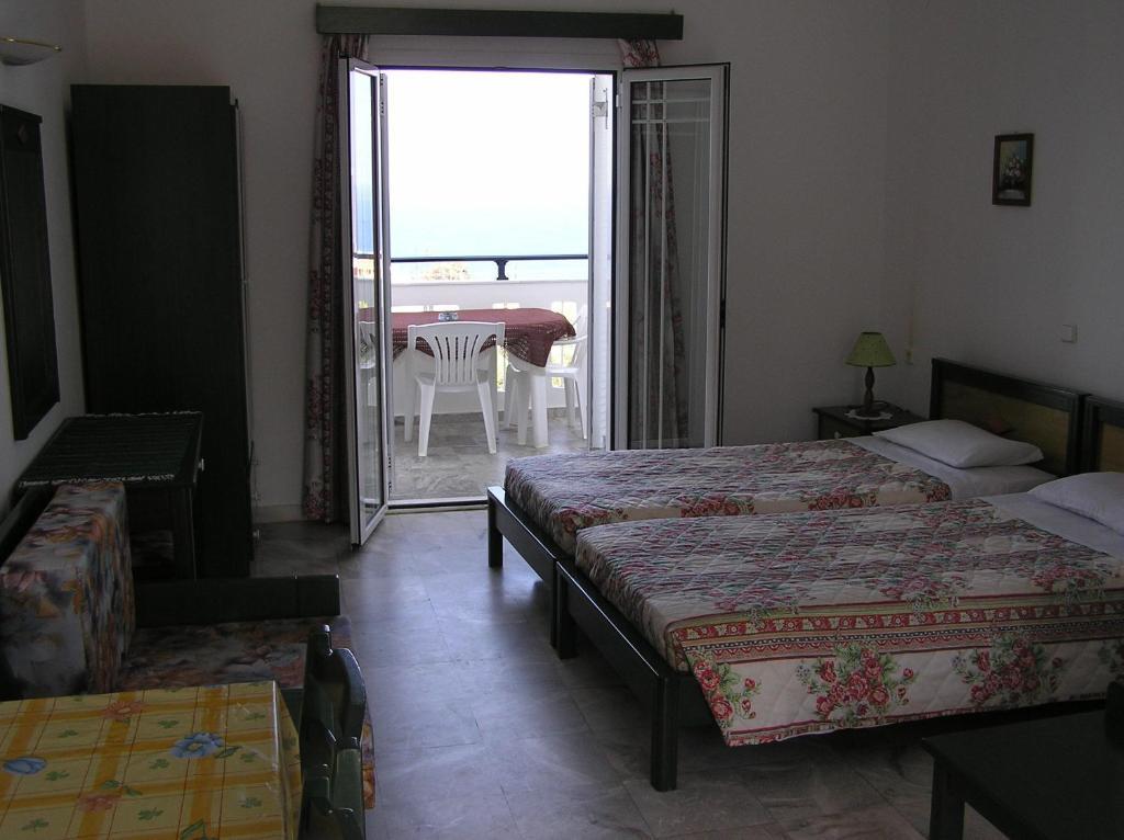 Aparthotel Knossos à Pánormos Chambre photo